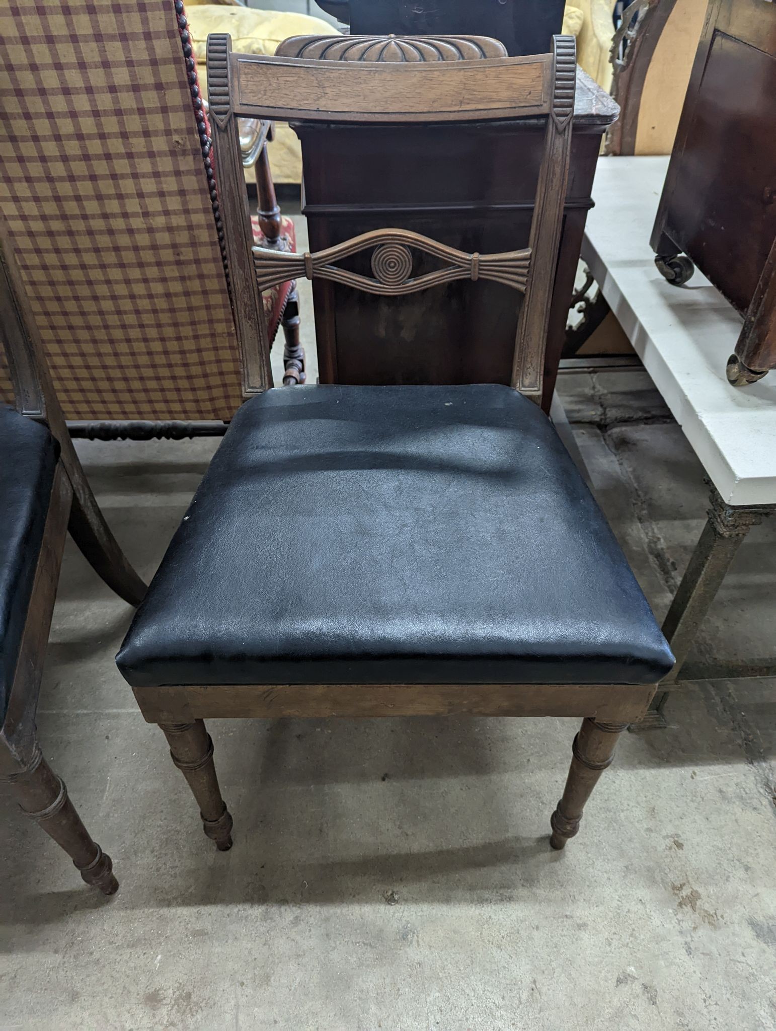A pair of Regency mahogany dining chairs